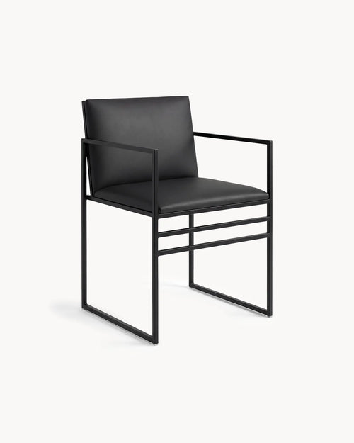 Dining Chair Sella by Crea with black frame and jade black leather seat, ideal for dining tables in residential interiors.